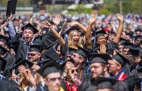 A photo of college students celebrating graduation