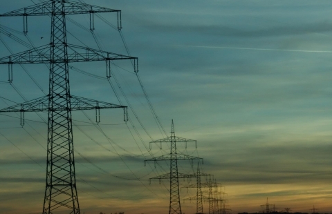 Photo of high tension wires at sunset