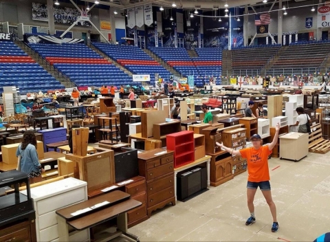An arena filled with used furniture